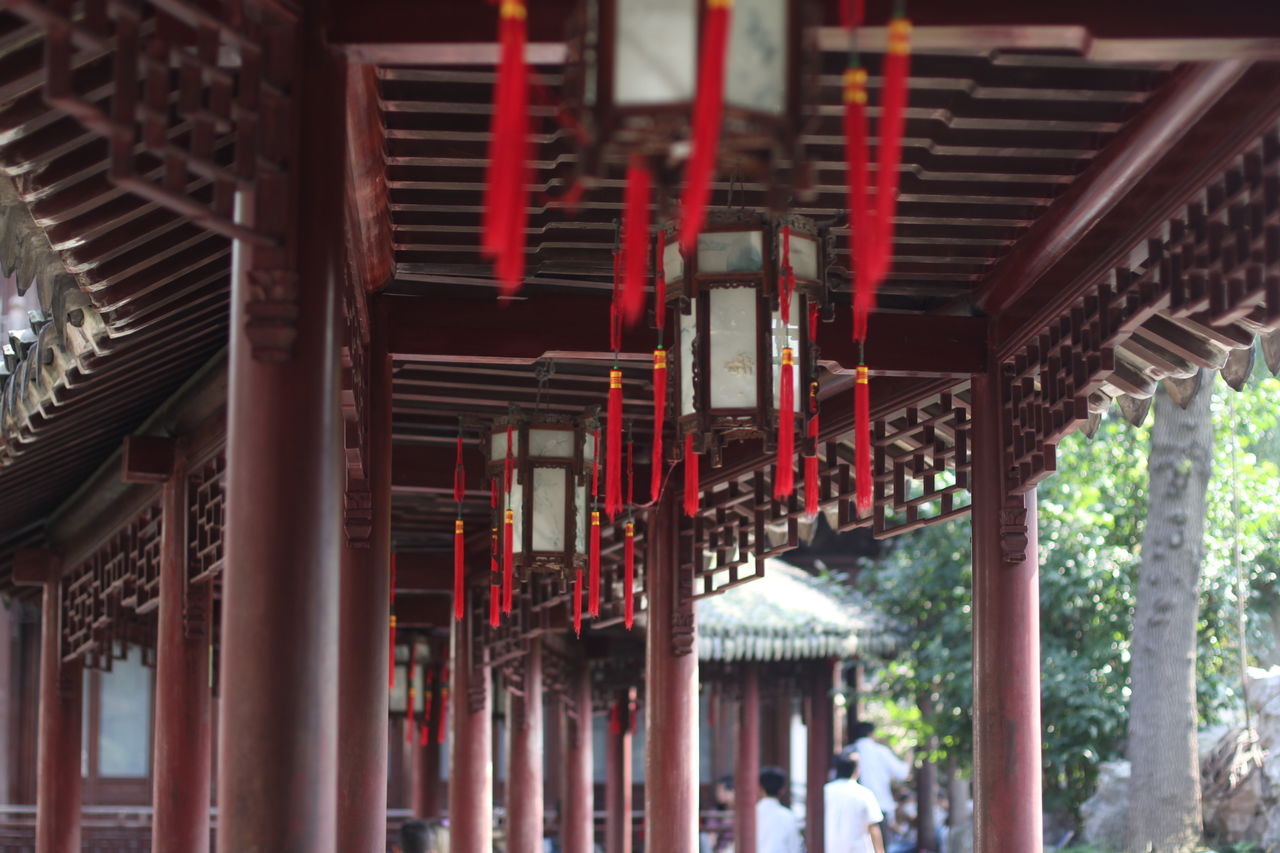 Chinese lanterns hanging on roof of colonnade at yu yuan garden