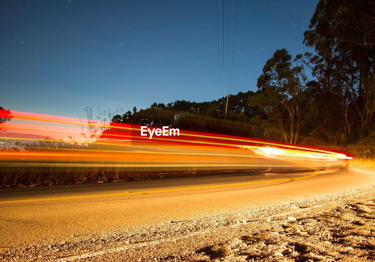 Light trails on road at night