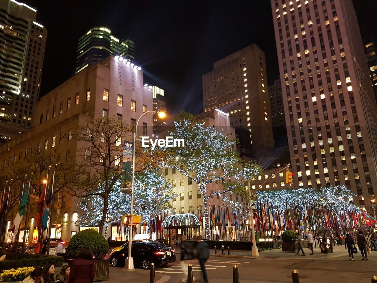 VIEW OF CITY STREET AT NIGHT