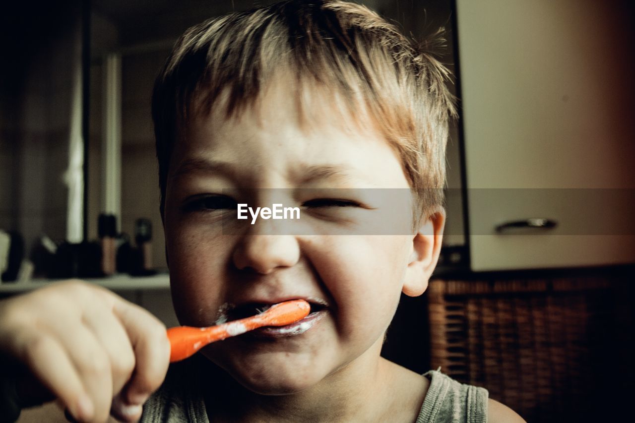 Boy brushing his teeth