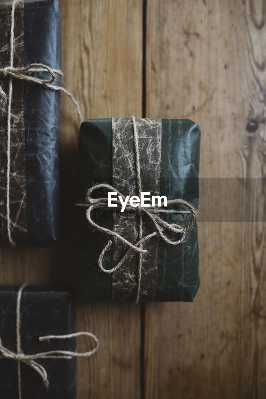 Packed presents on wooden background