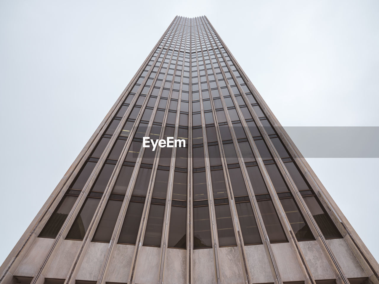 Low angle view of modern building against clear sky