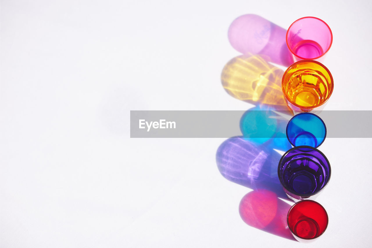 high angle view of pills and medicines over white background