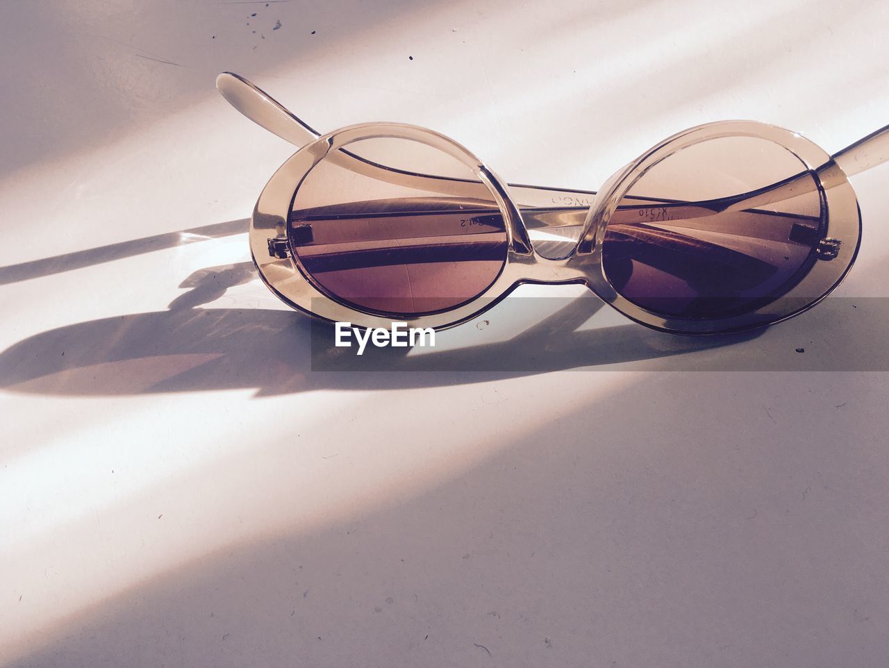 Close-up of sunglasses on table