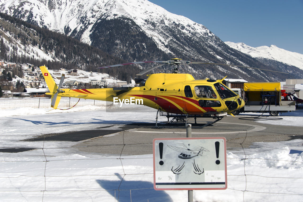 A rescue helicopter in the mountains in st moritz