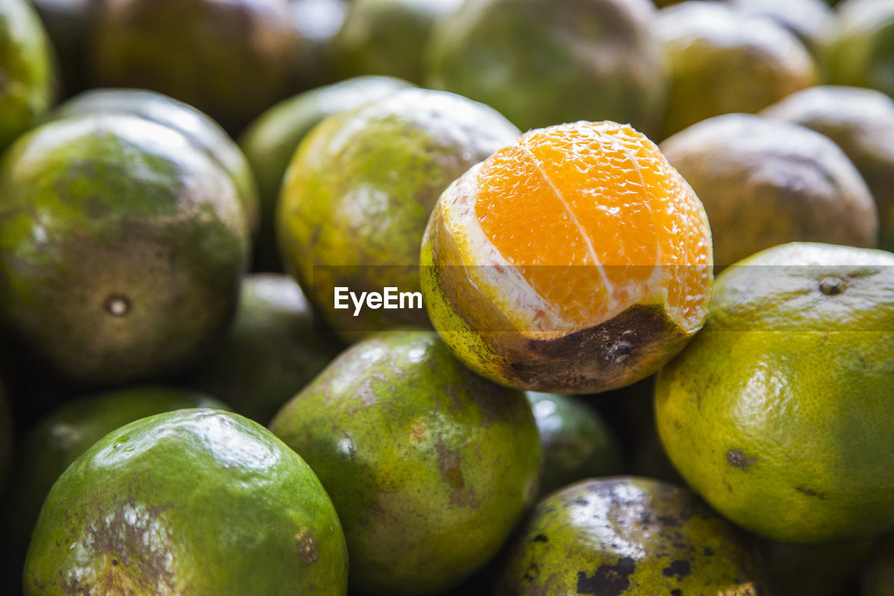 Close-up of oranges for sale at market stall