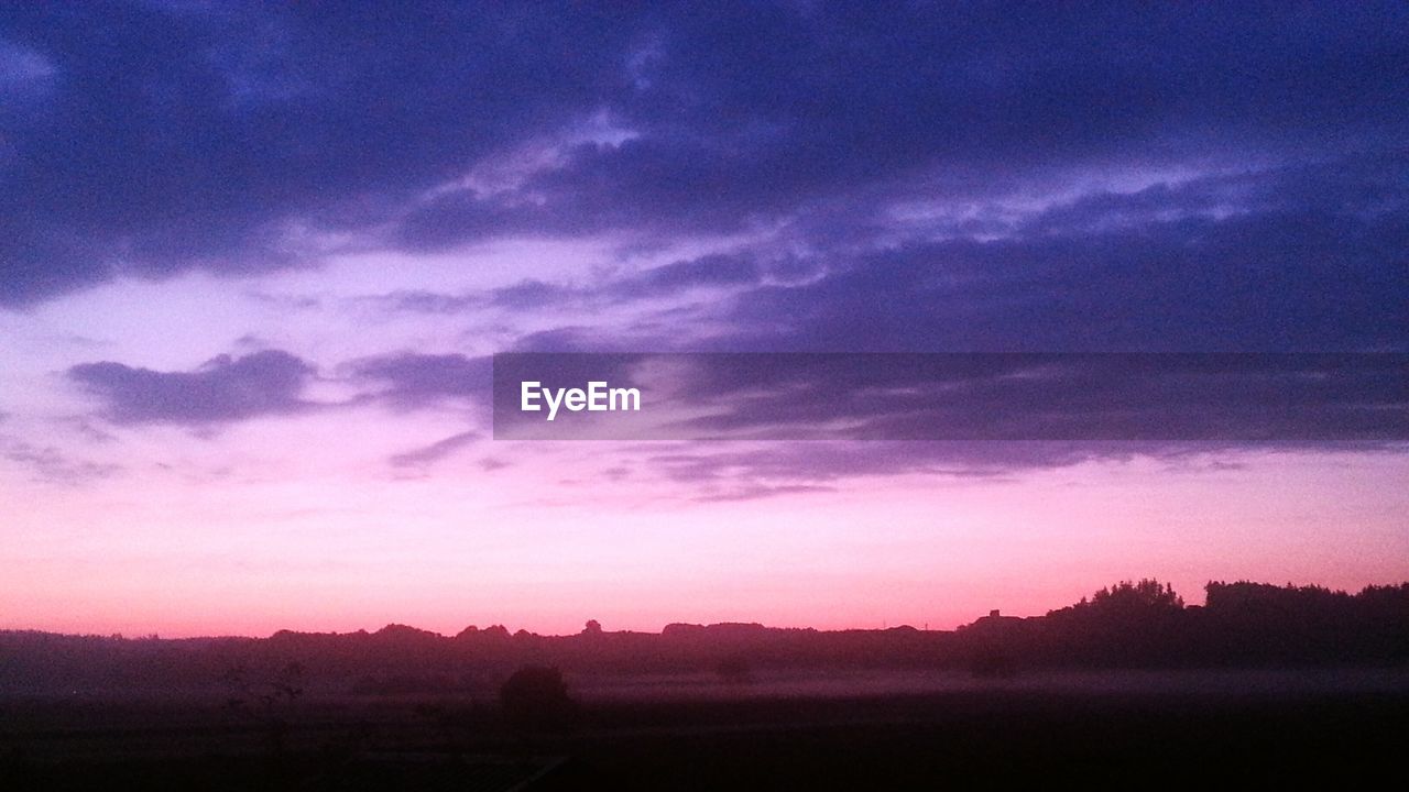 SILHOUETTE LANDSCAPE AT SUNSET