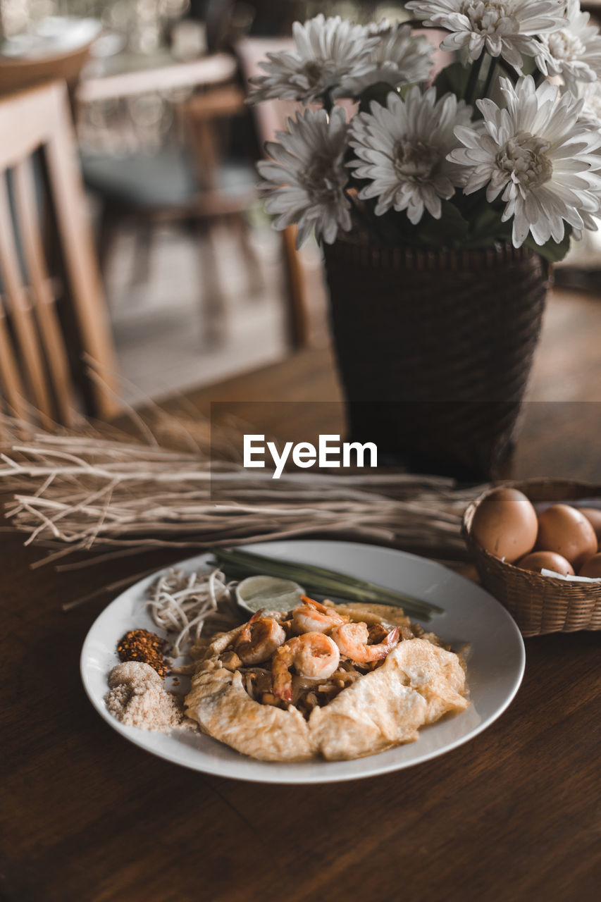 Close-up of breakfast served in plate on table