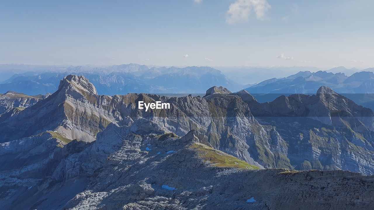 Scenic view of rocky mountains against sky