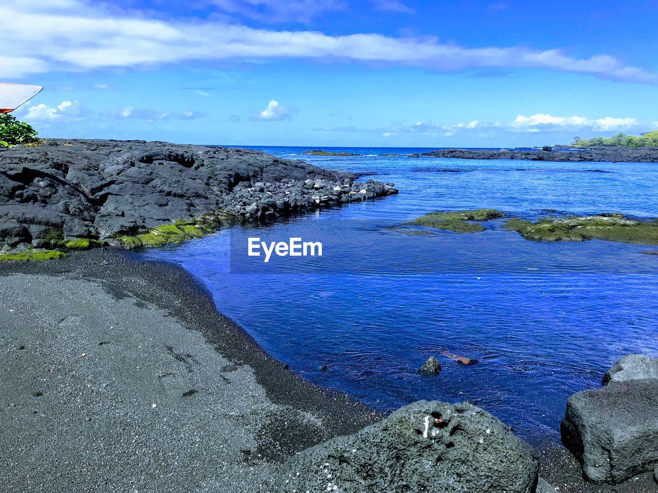 SCENIC VIEW OF SEA AGAINST BLUE SKY