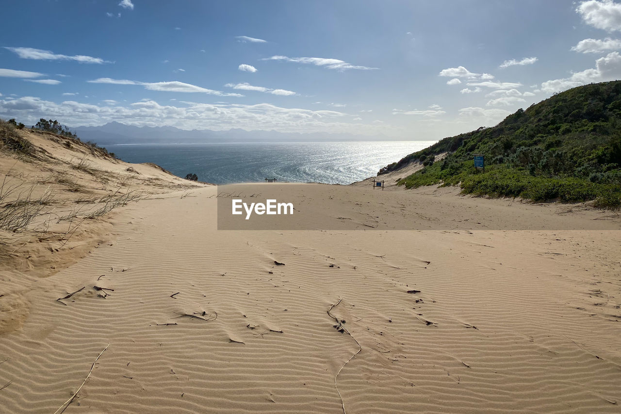 Scenic view of witsand at robberg nature reserve hiking trail in the morning