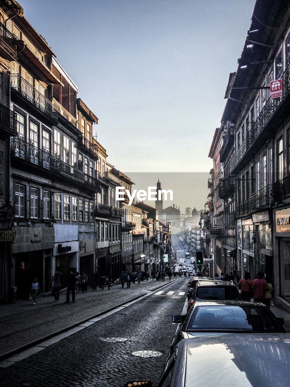 Road amidst buildings in city