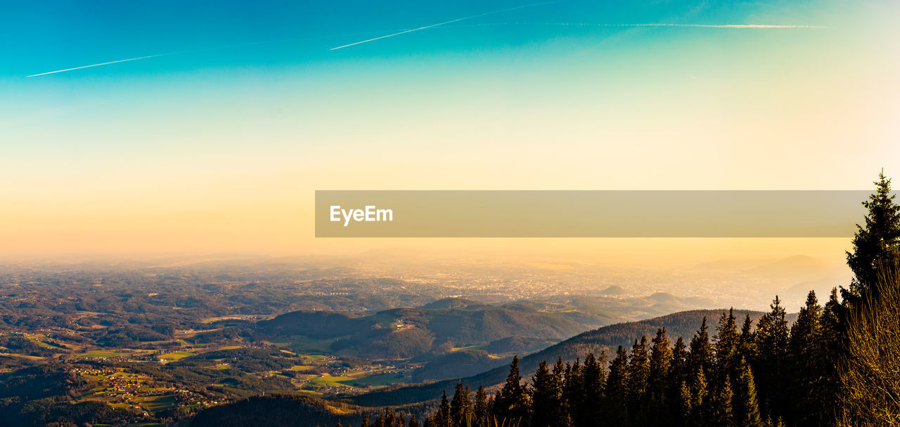 SCENIC VIEW OF SILHOUETTE MOUNTAIN AGAINST SKY DURING SUNSET