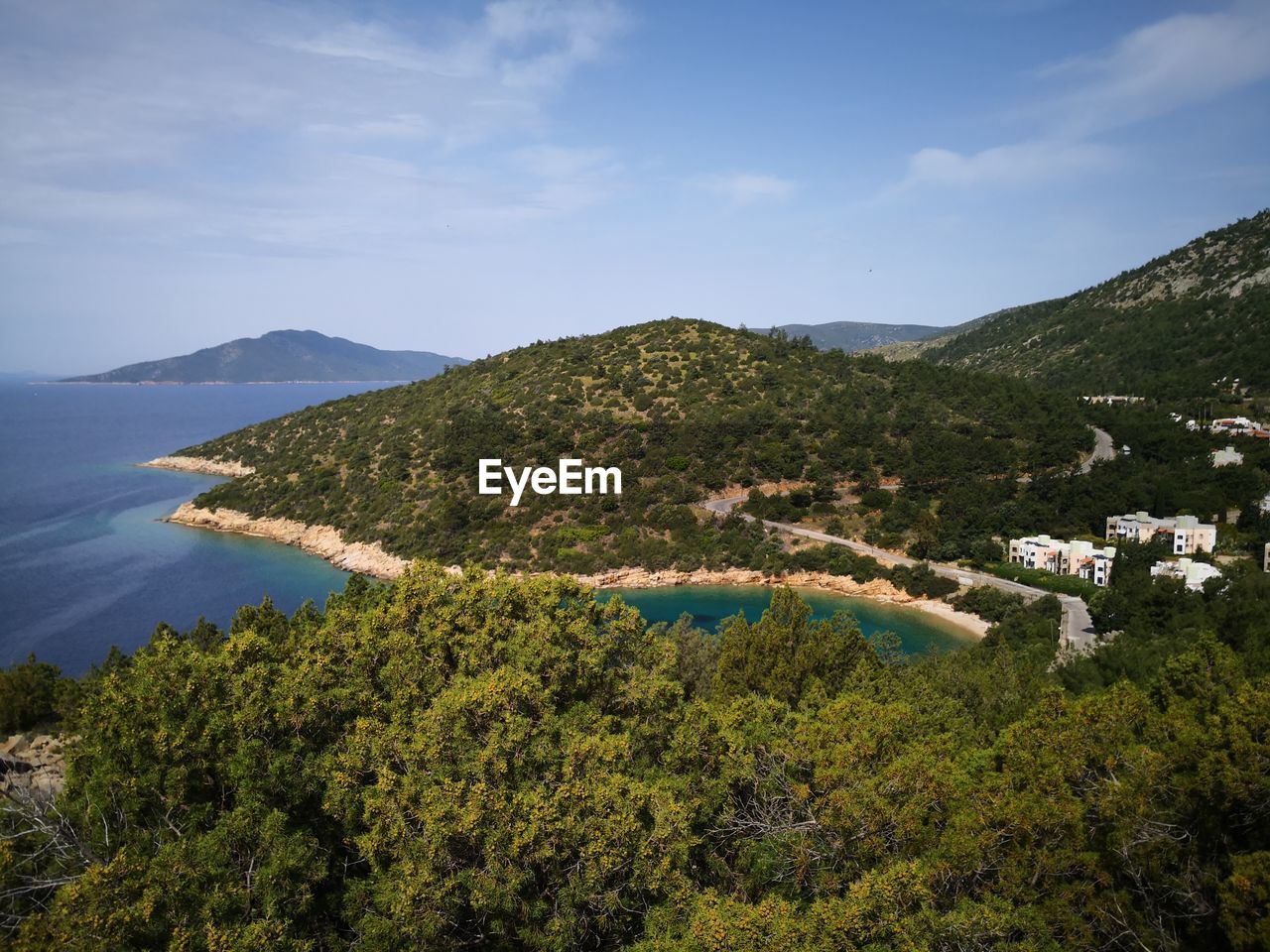 High angle view of trees and mountains against sky