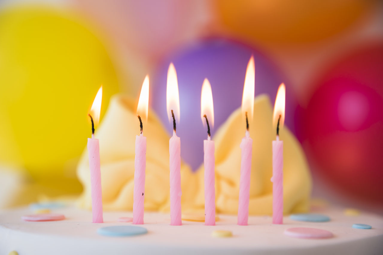 close-up of burning candles