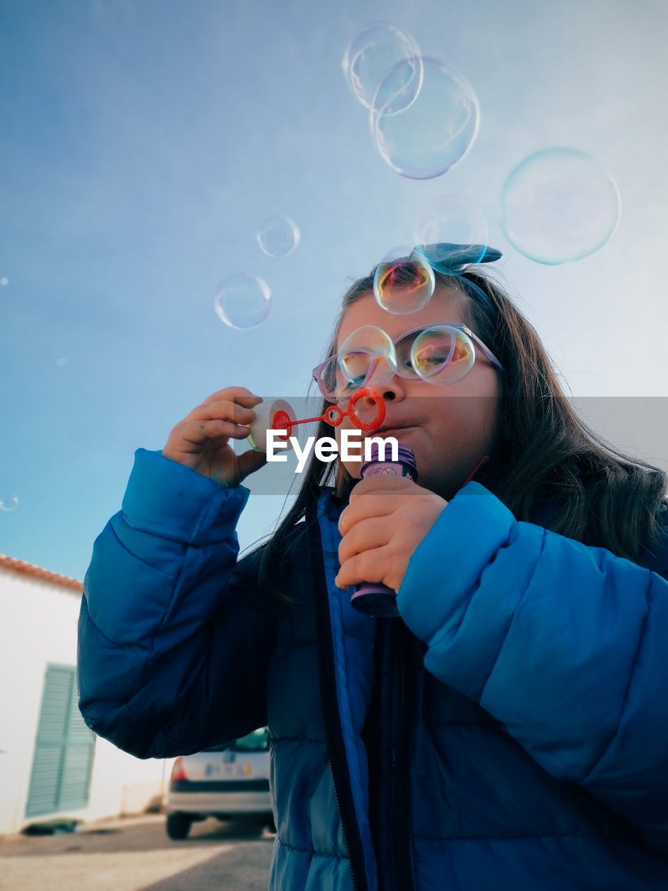 Woman standing at bubbles