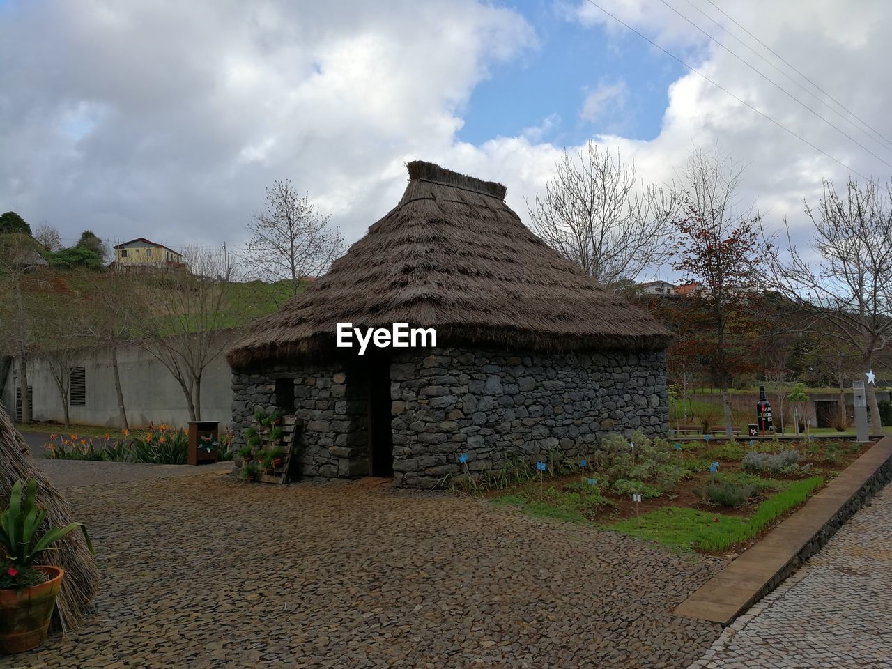 BUILT STRUCTURE AGAINST TREES