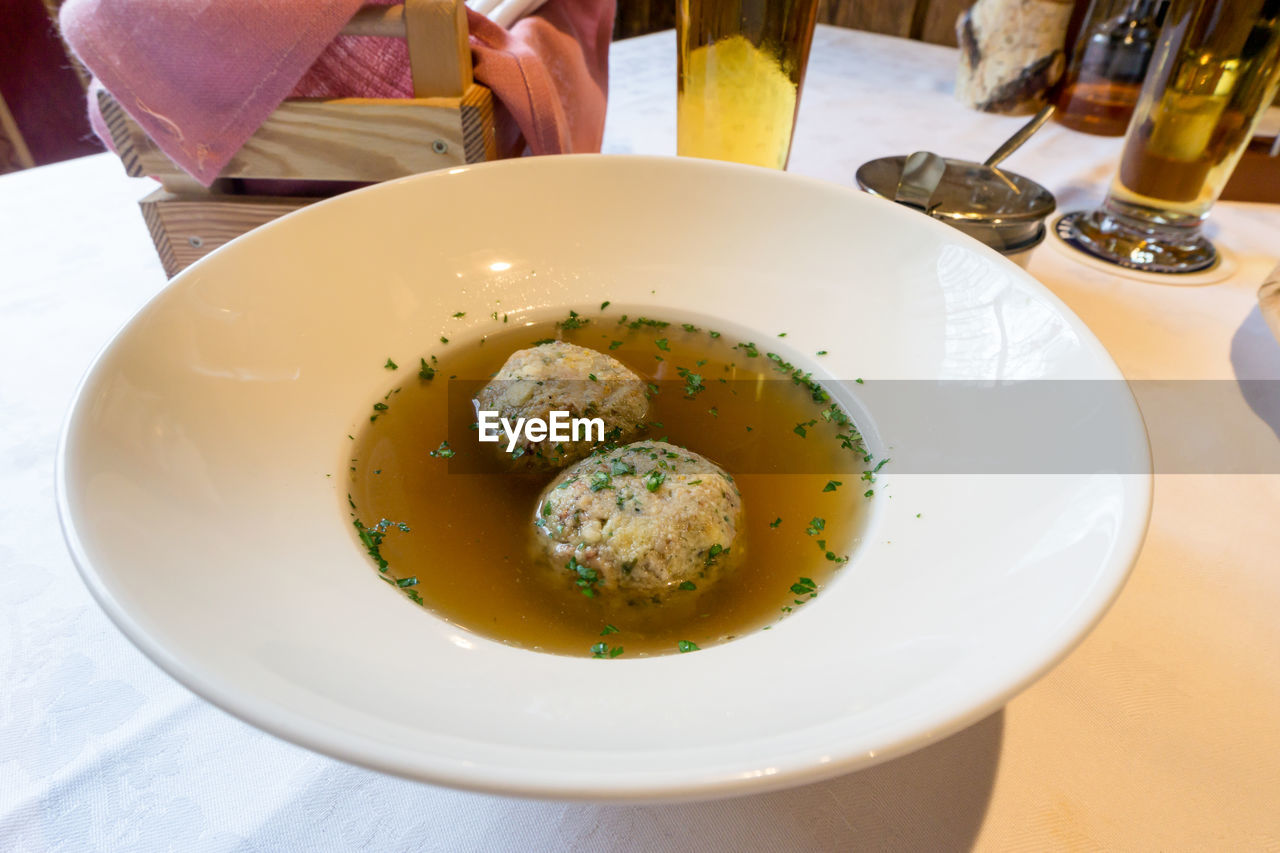 CLOSE-UP OF FOOD SERVED IN PLATE ON TABLE