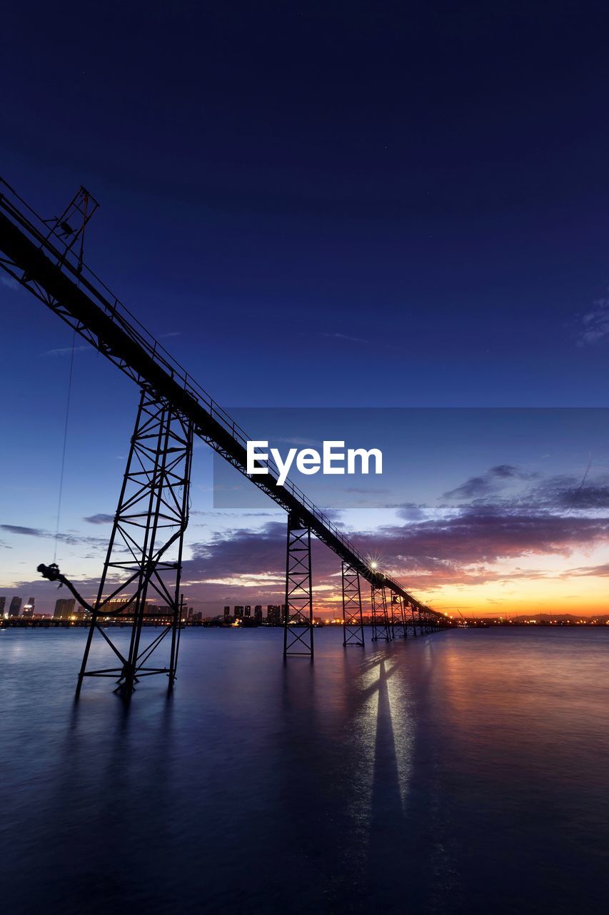 View of bridge over sea against sky