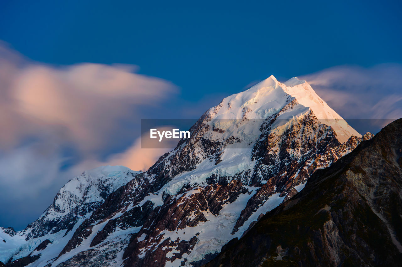 SCENIC VIEW OF SNOWCAPPED MOUNTAIN AGAINST SKY