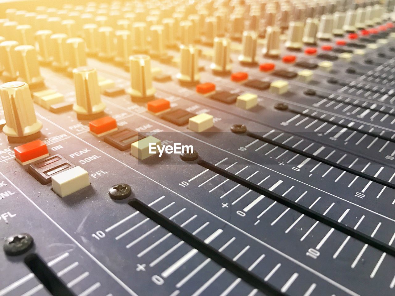 Close-up of sound mixer in recording studio