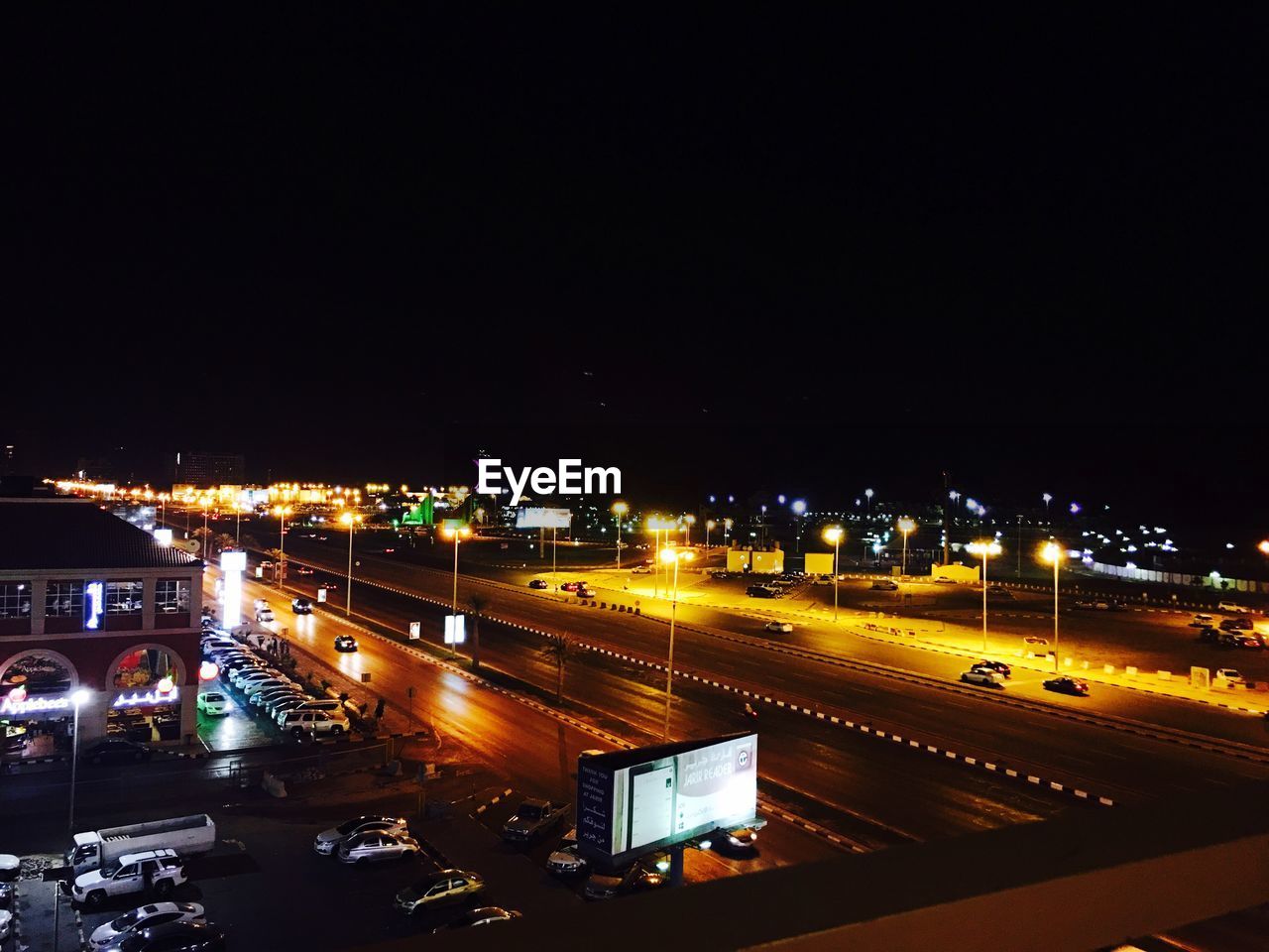 High angle view of light trails on road at night