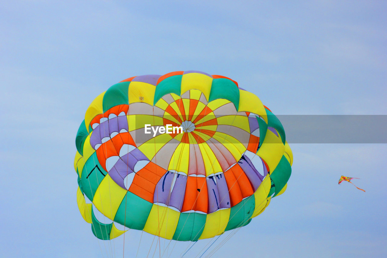 Low angle view of hot air balloons against sky