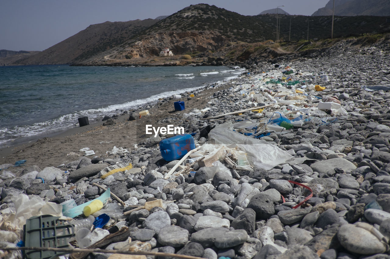 SCENIC VIEW OF ROCKS ON BEACH