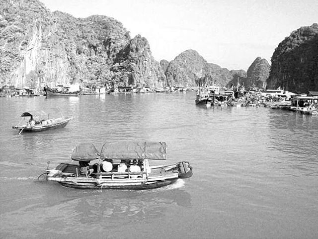 VIEW OF BOATS IN SEA