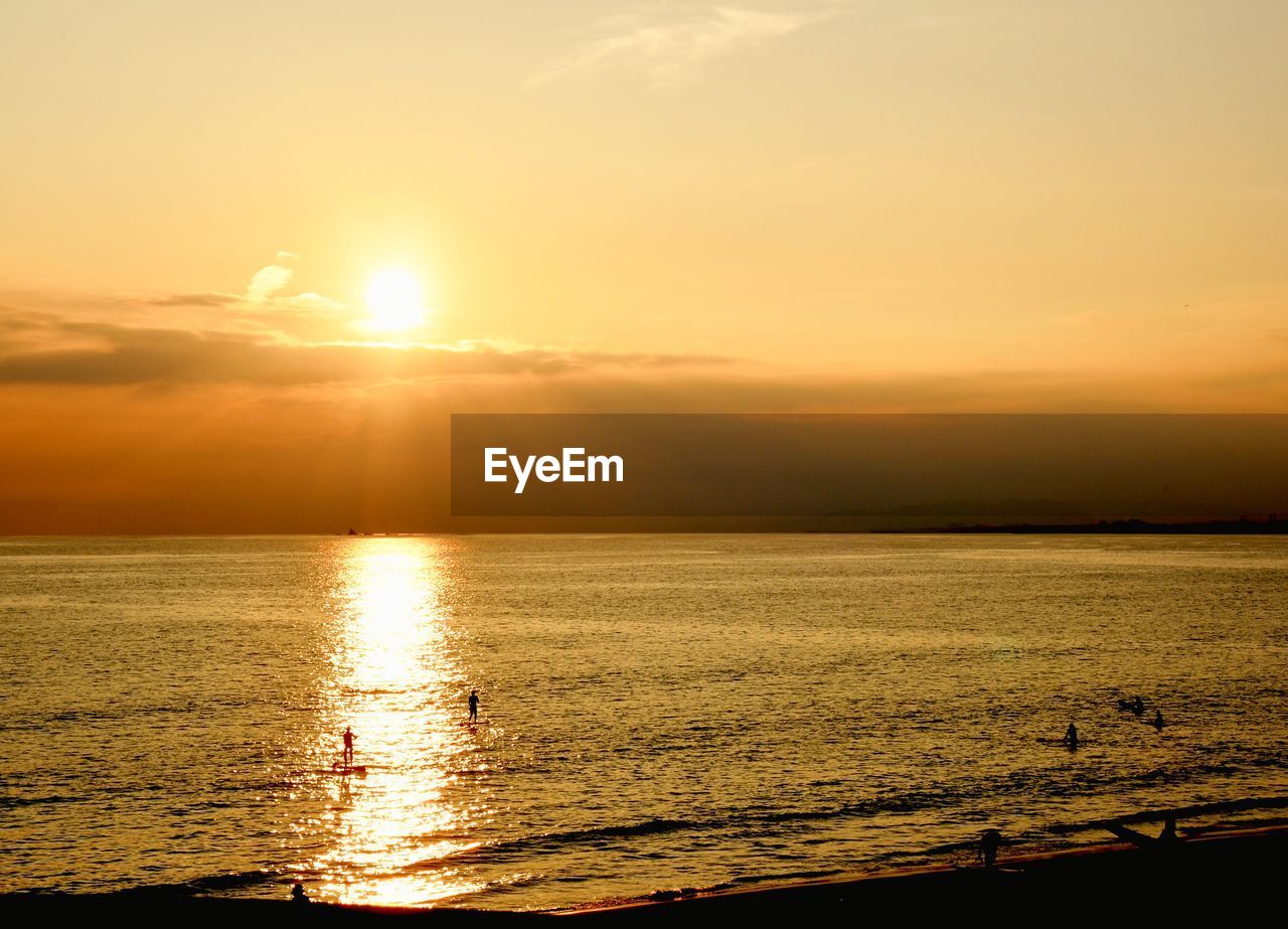 View of calm sea at sunset