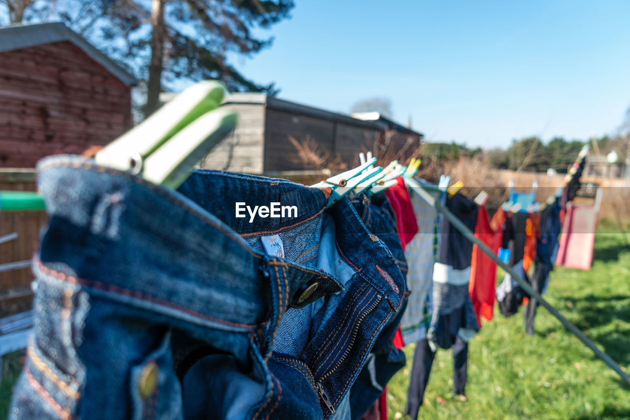 Clothes drying on a washing line in a residential garden