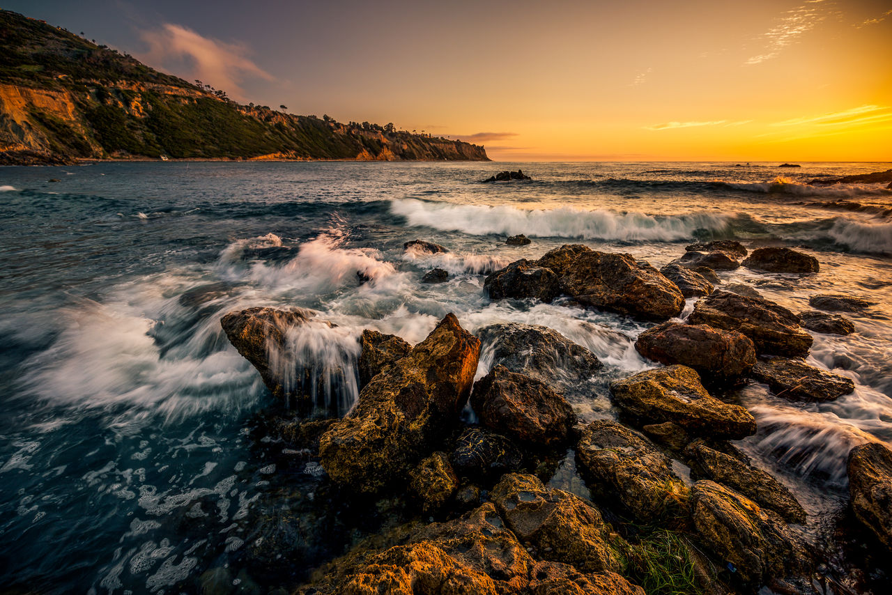 Scenic view of sea against sky during sunset