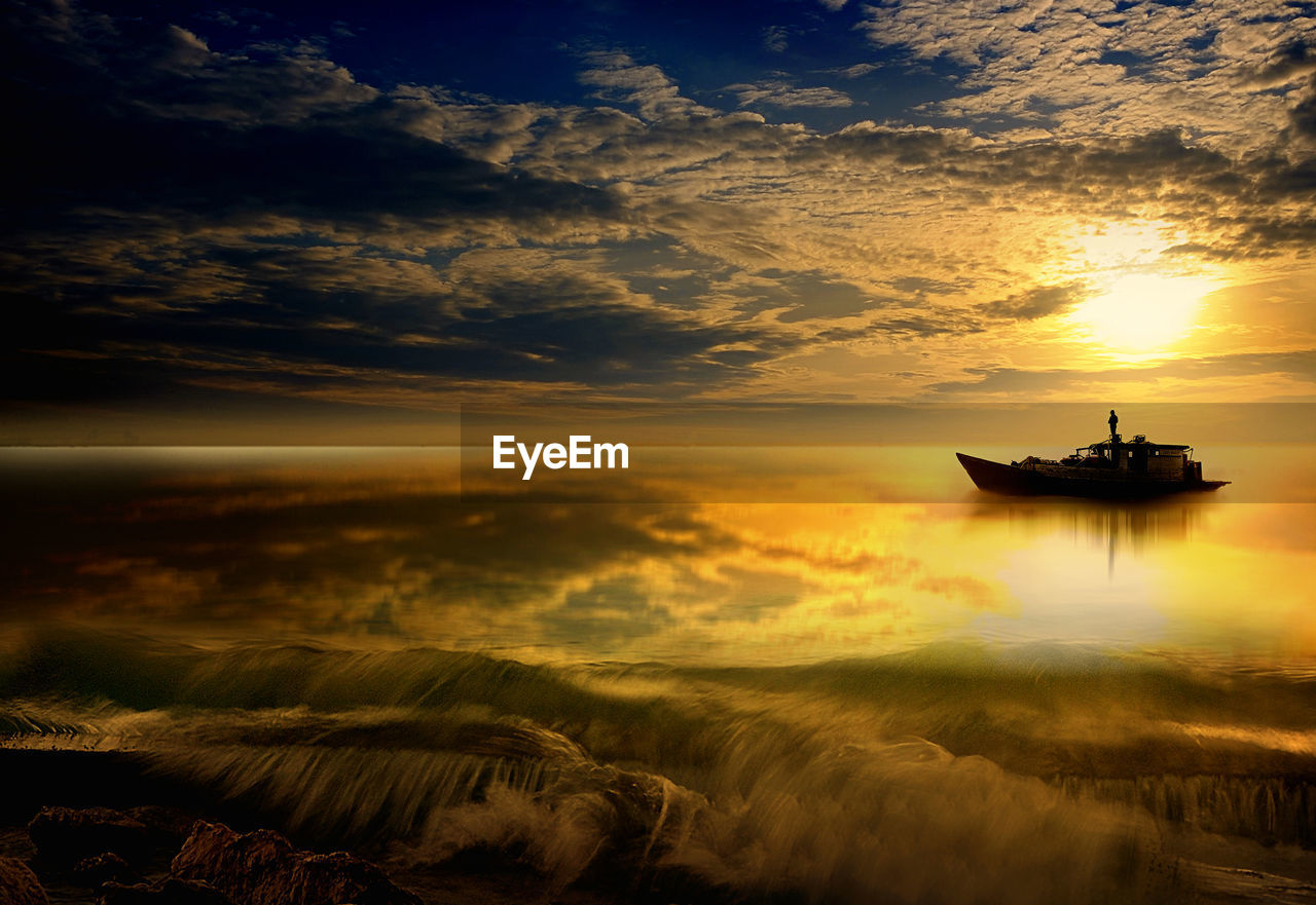 SILHOUETTE BOAT IN SEA AGAINST ORANGE SKY