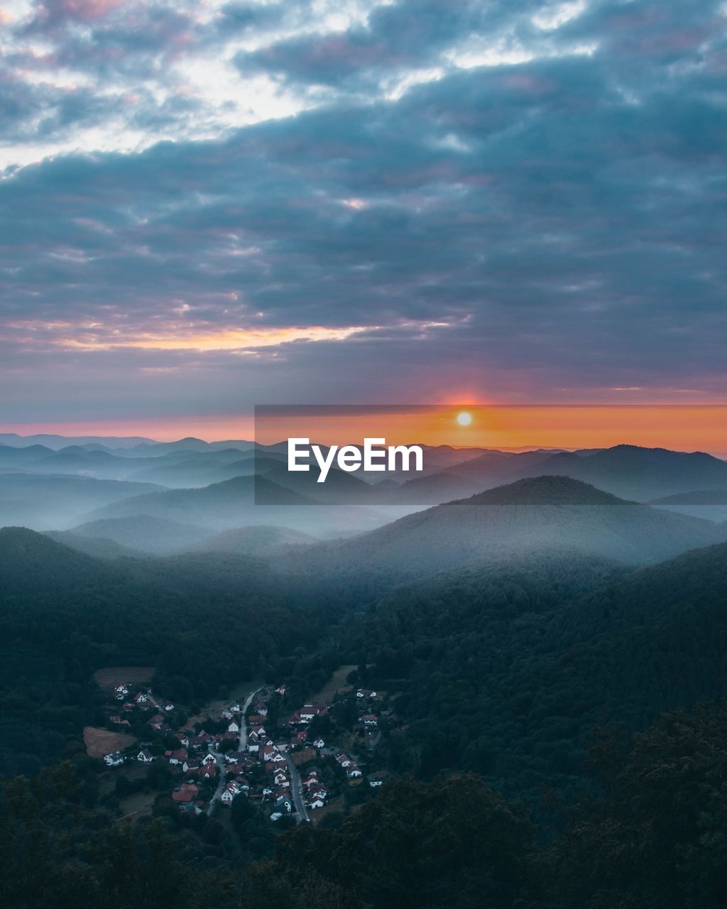 Scenic view of mountains against sky during sunset