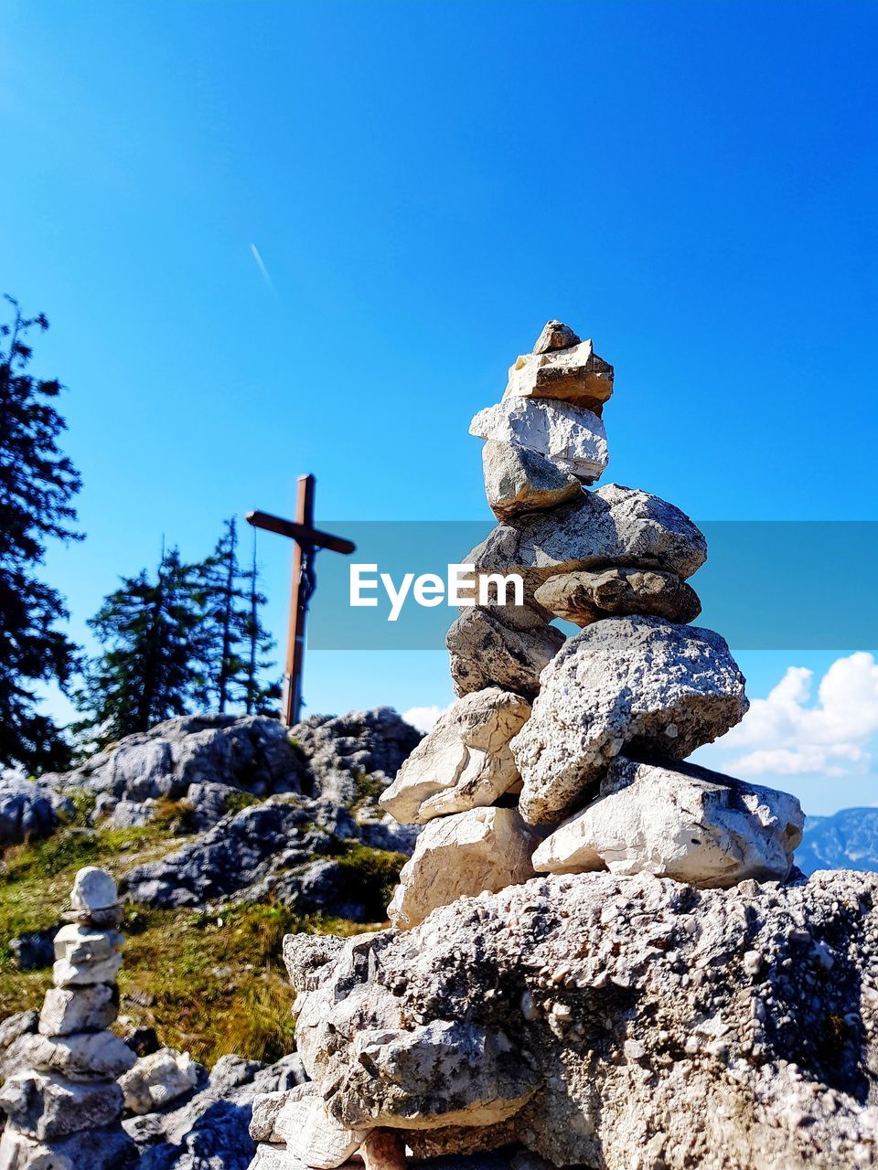 low angle view of stone wall against clear blue sky