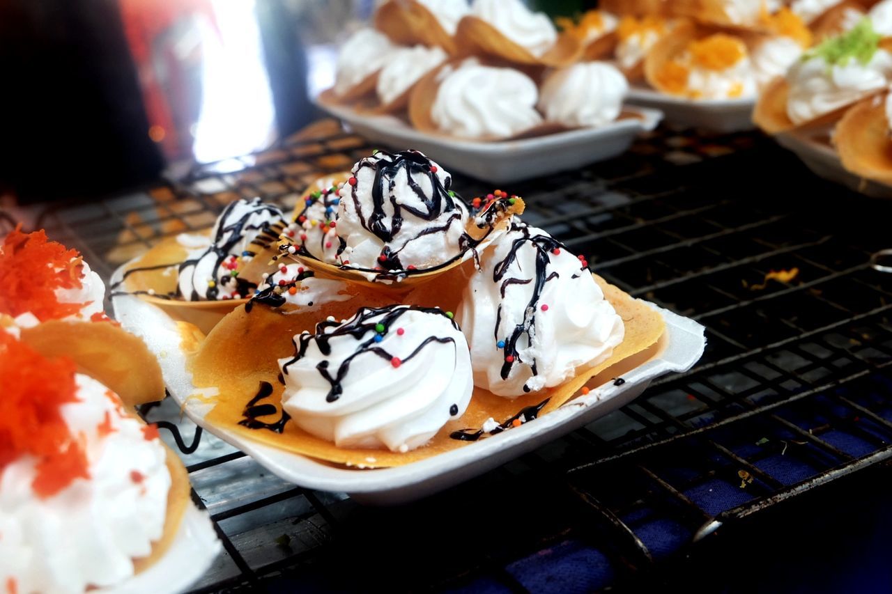 Close-up of sweet food on cooling rack