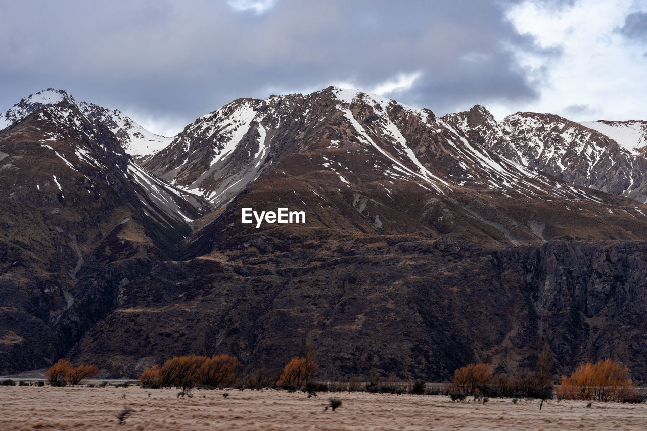 Scenic view along the mount cook road alongside with snow capped southern alps and majestic mt cook.