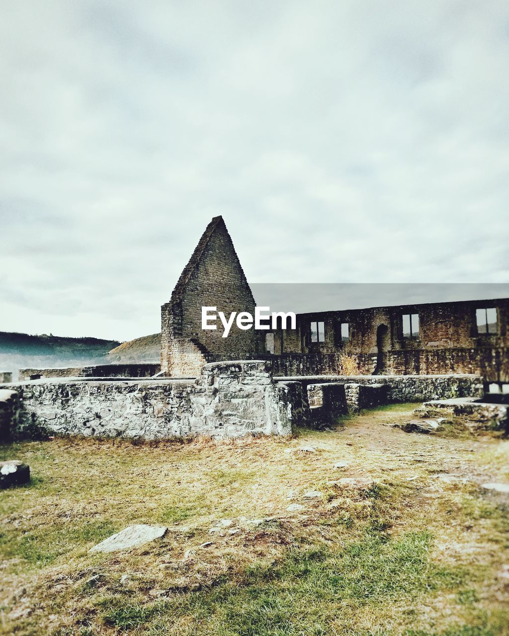 ABANDONED BUILDING AGAINST SKY