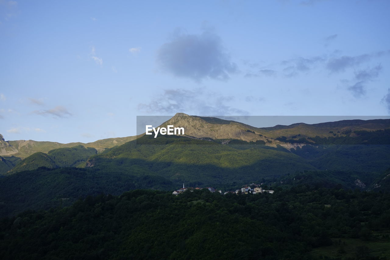 SCENIC VIEW OF MOUNTAIN AGAINST SKY