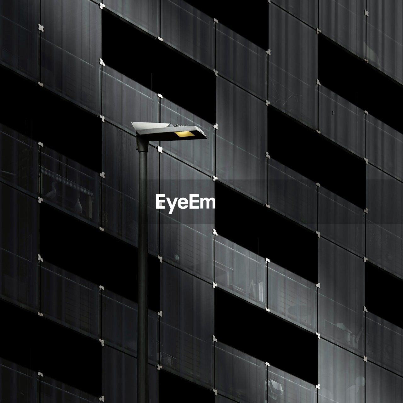 Full frame shot of building with streetlight 