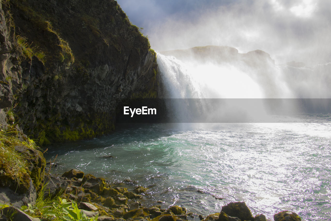 Peaceful scene at godafoss in the north of iceland on a lightly overcast summer day