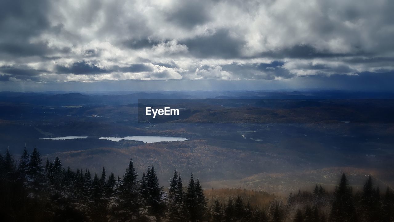 SCENIC VIEW OF LANDSCAPE AGAINST CLOUDY SKY