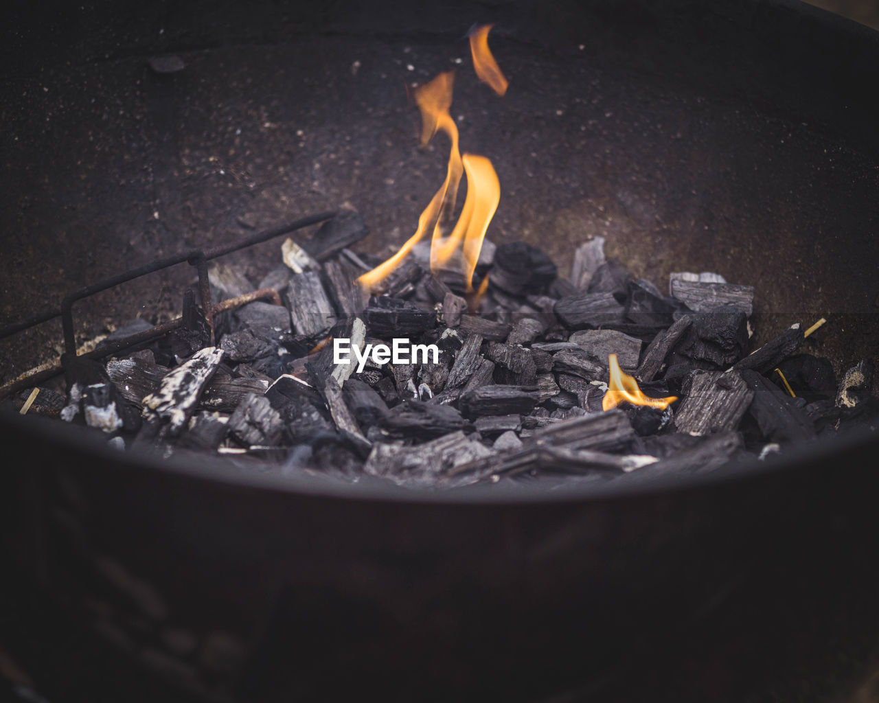 CLOSE-UP OF BONFIRE ON WOOD