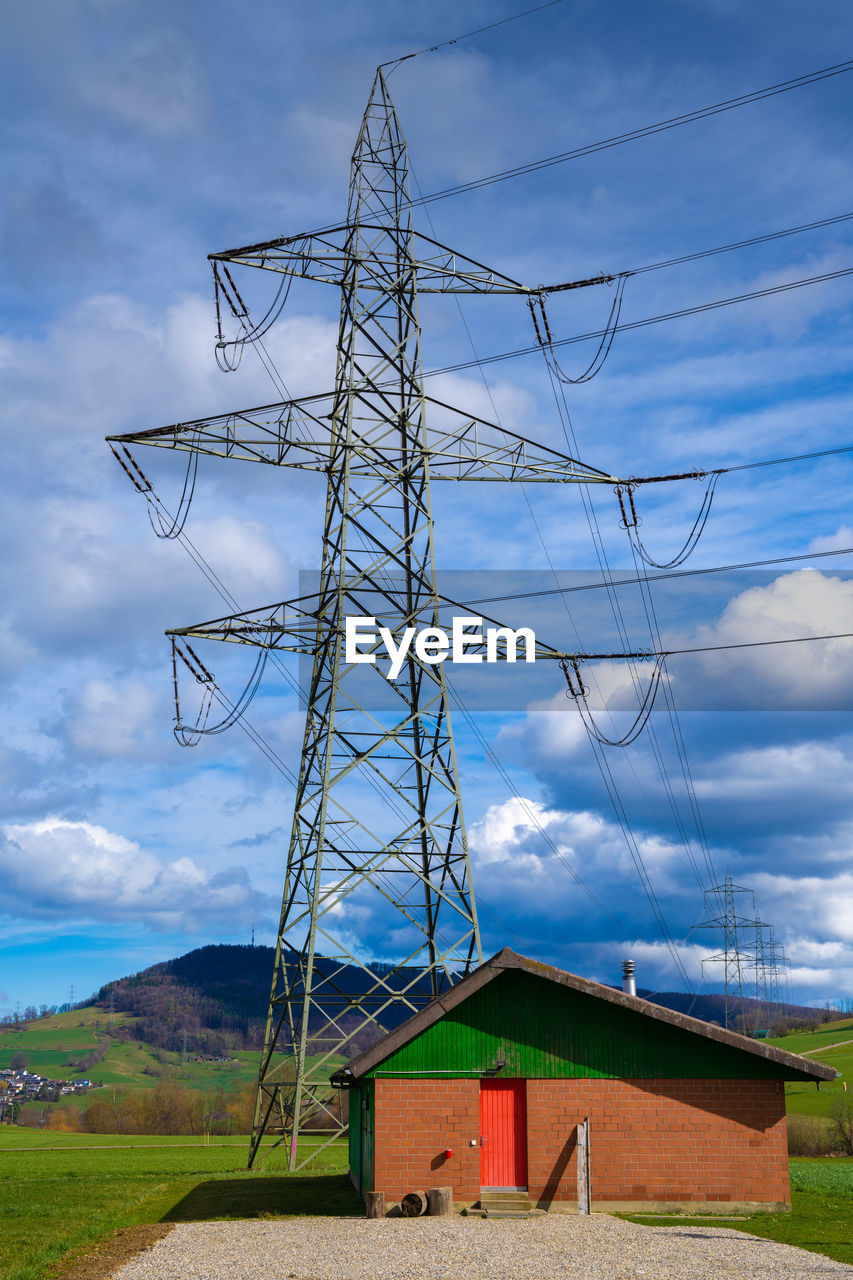 LOW ANGLE VIEW OF ELECTRICITY PYLON AGAINST SKY