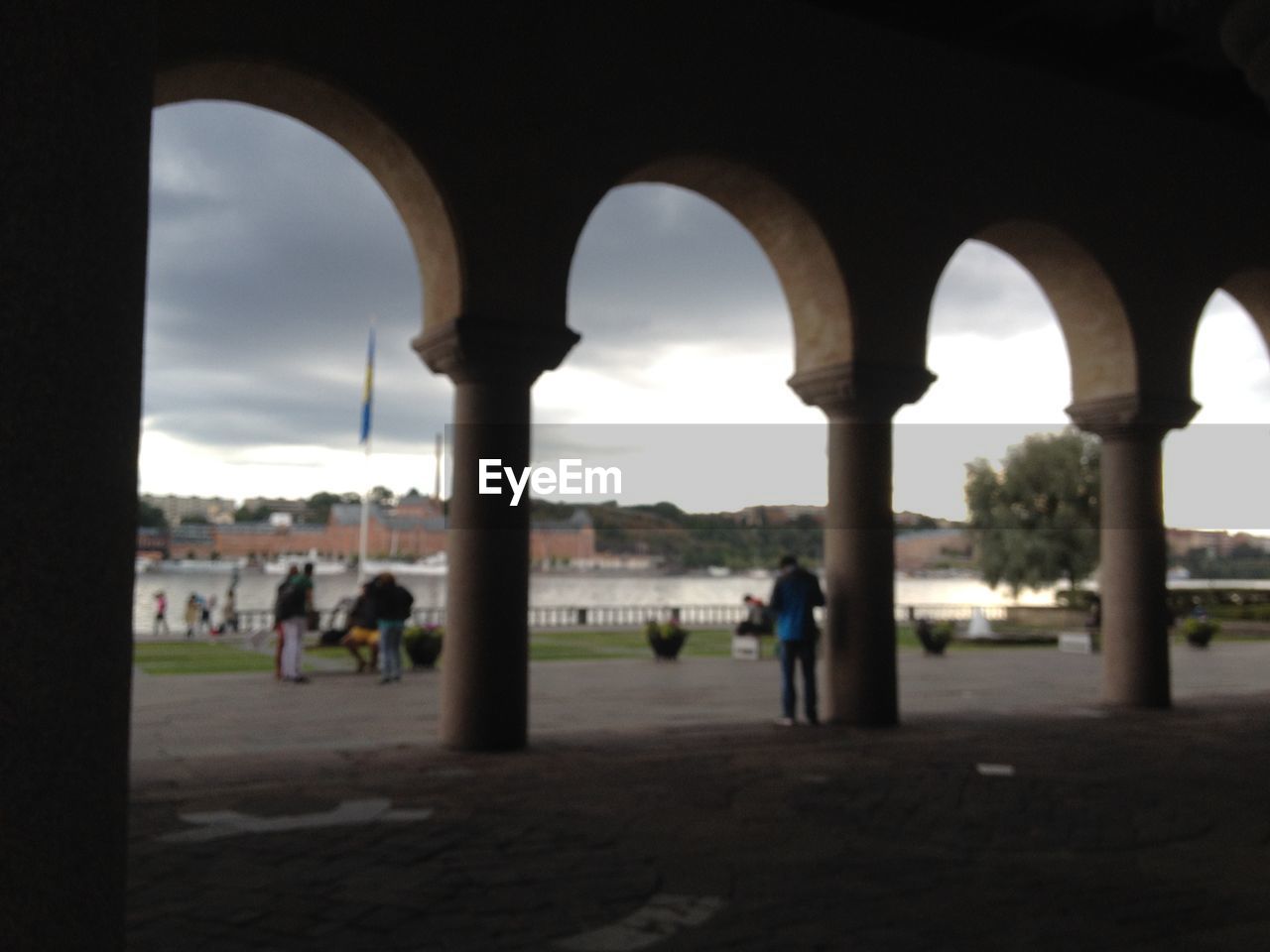 PEOPLE WALKING IN COURTYARD