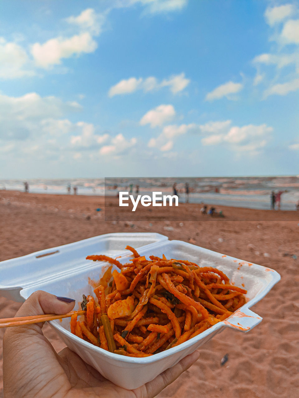 CLOSE-UP OF FOOD ON BEACH