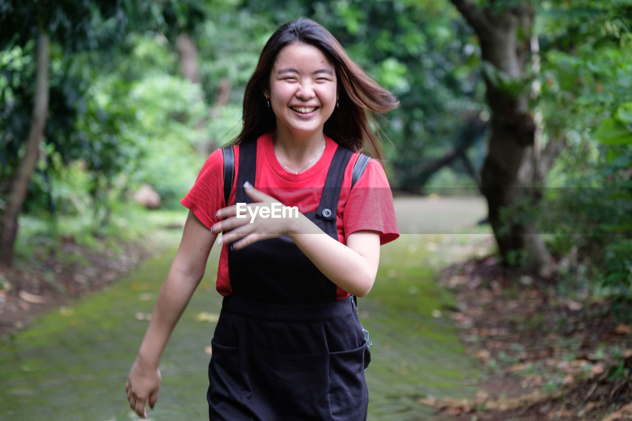 Smiling woman at park