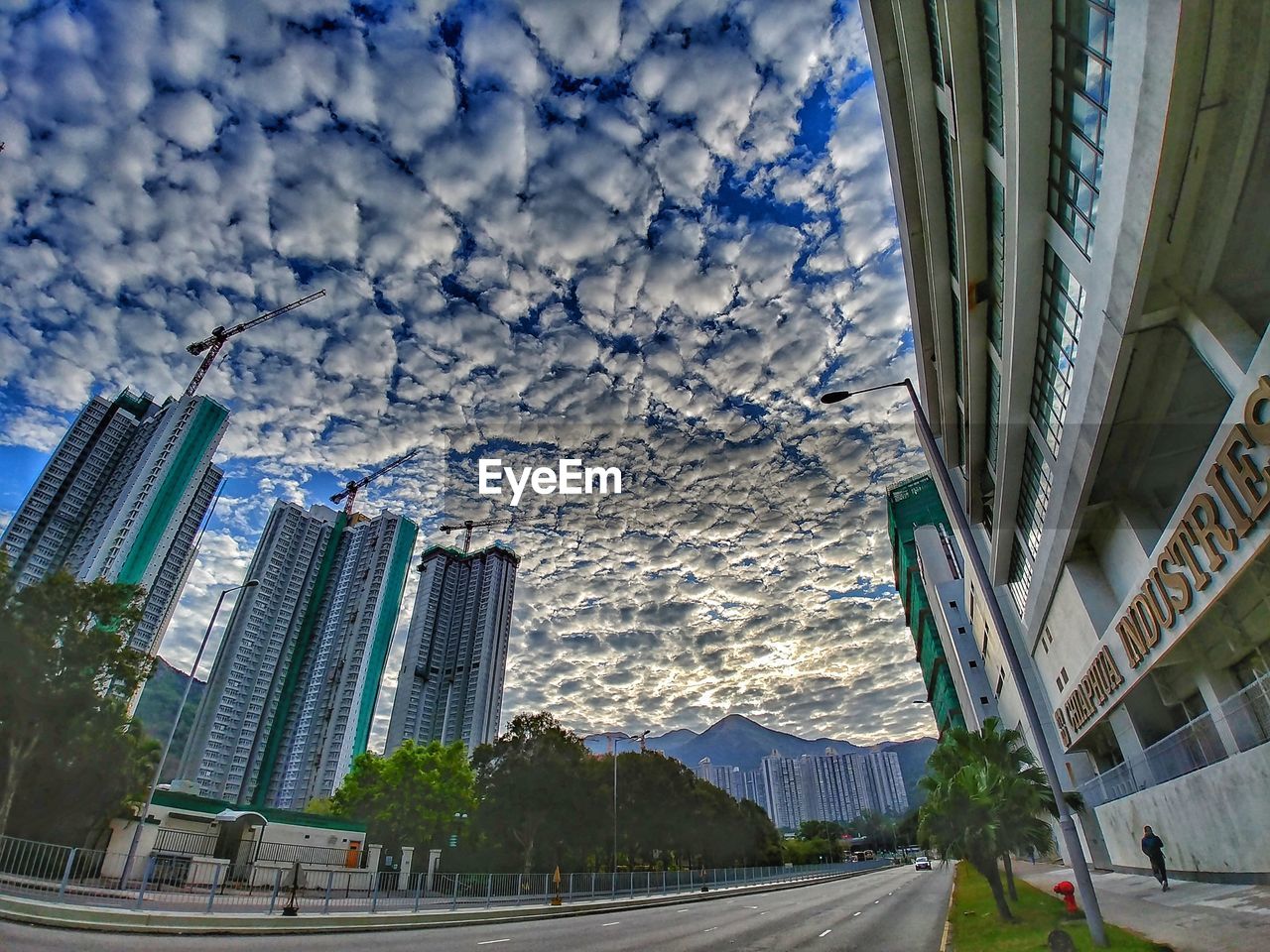 PANORAMIC VIEW OF CITY AGAINST SKY