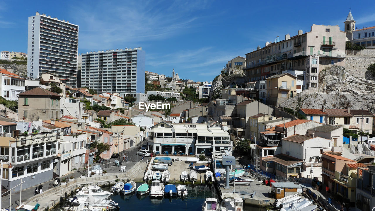 High angle view of buildings against sky in city