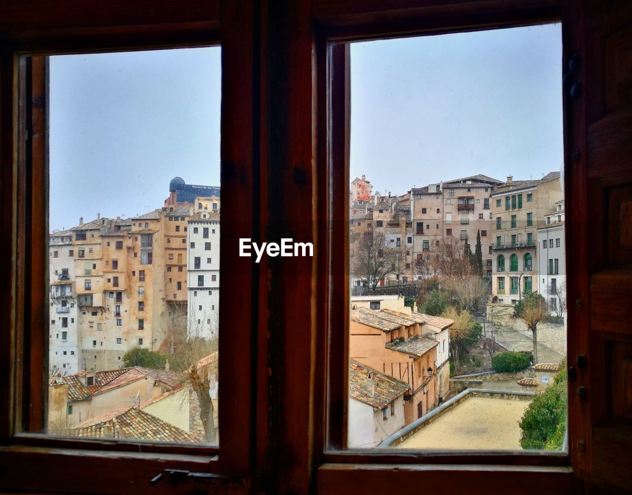 BUILDINGS SEEN THROUGH WINDOW